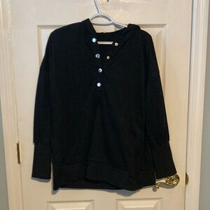 Women’s Large hooded top with thumb holes and front buttons.
